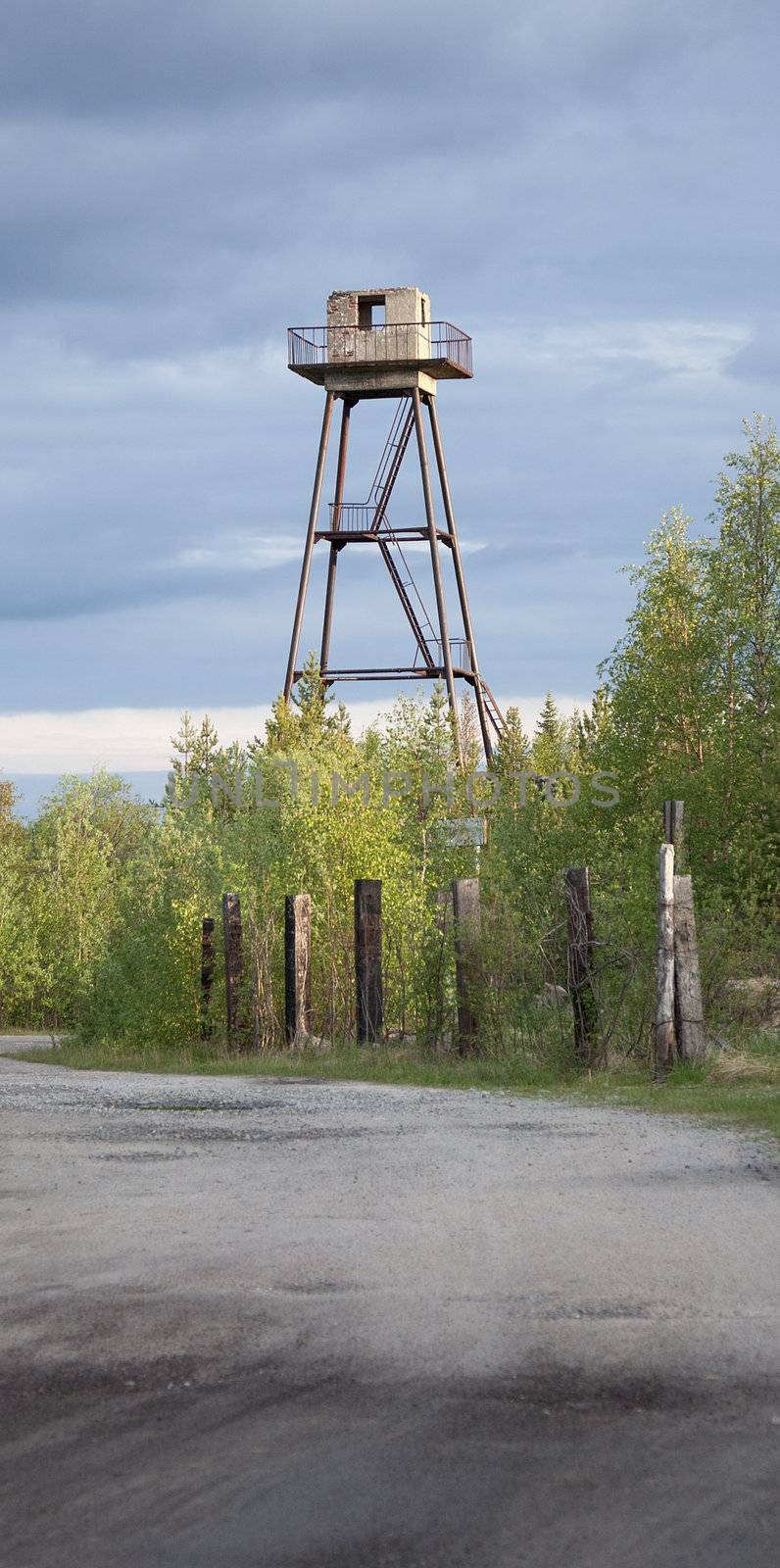 The ancient, thrown sentry prison tower