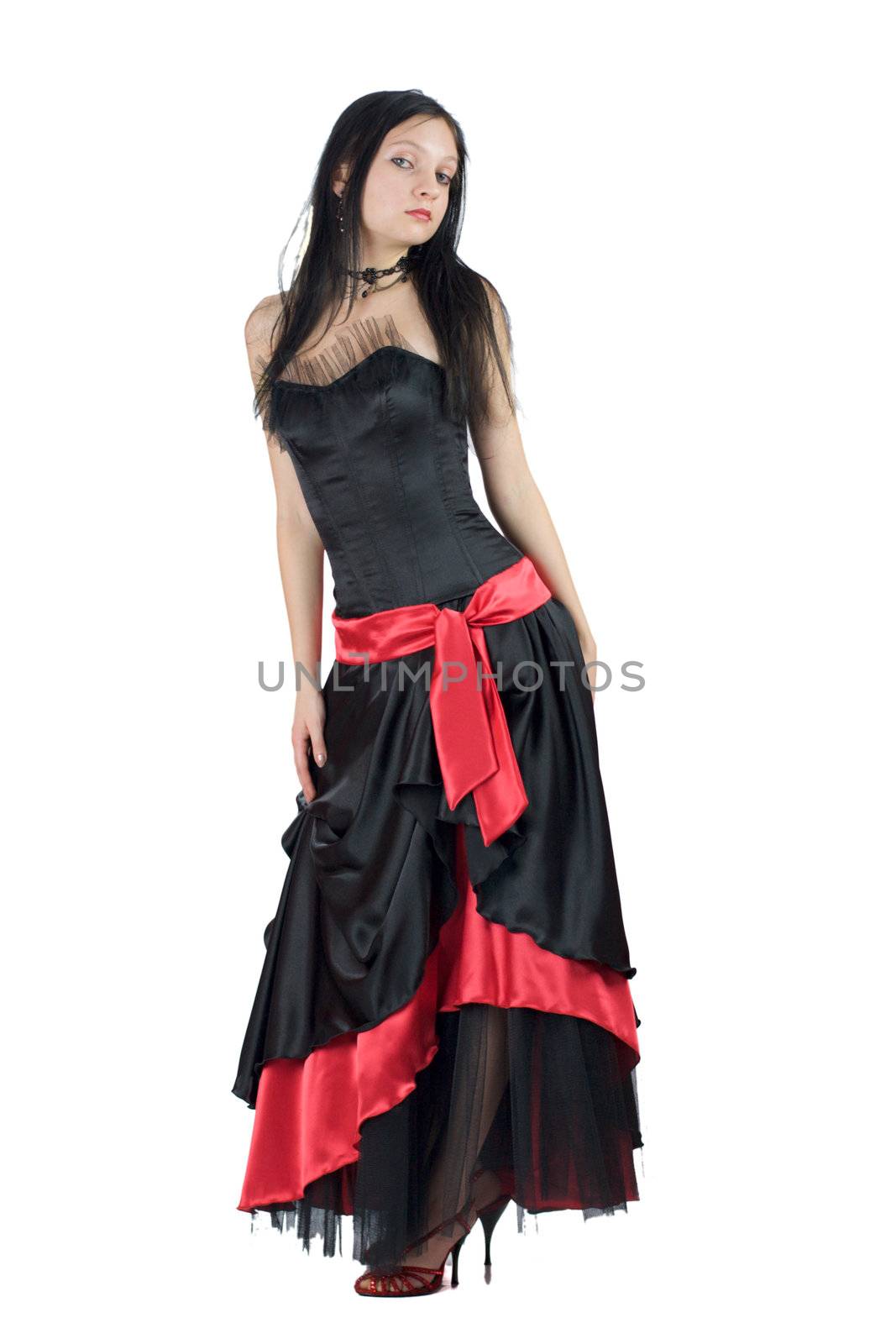 Beautiful Gothic Girl wearing black dress with red ornate isolated on white