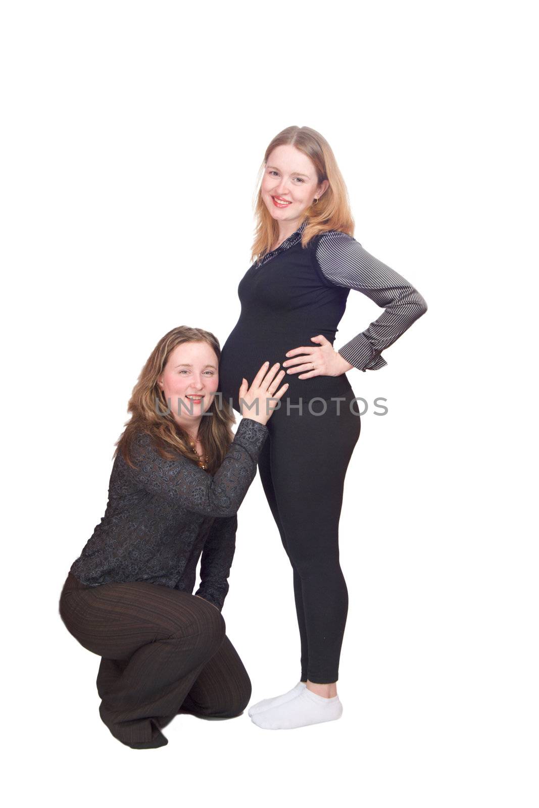 Family of two women expecting for baby appearing isolated on white