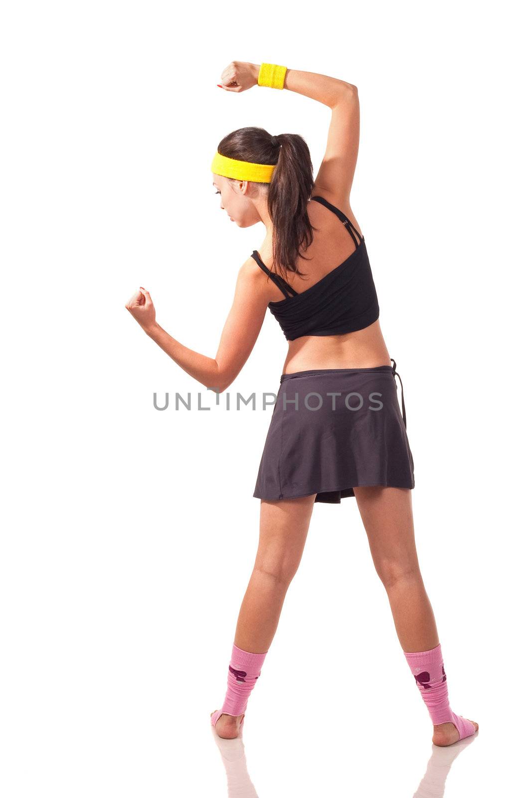 Photo of a young girl doing a fitness exercises