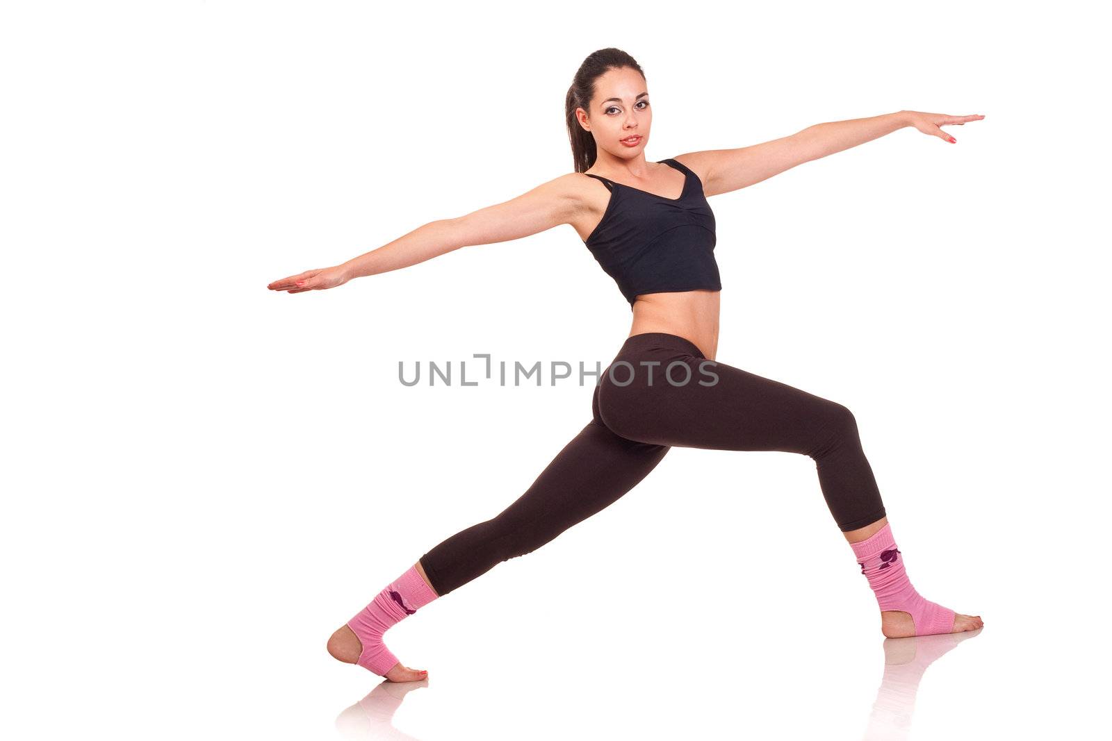 young girl doing a fitness exercises by igor_stramyk