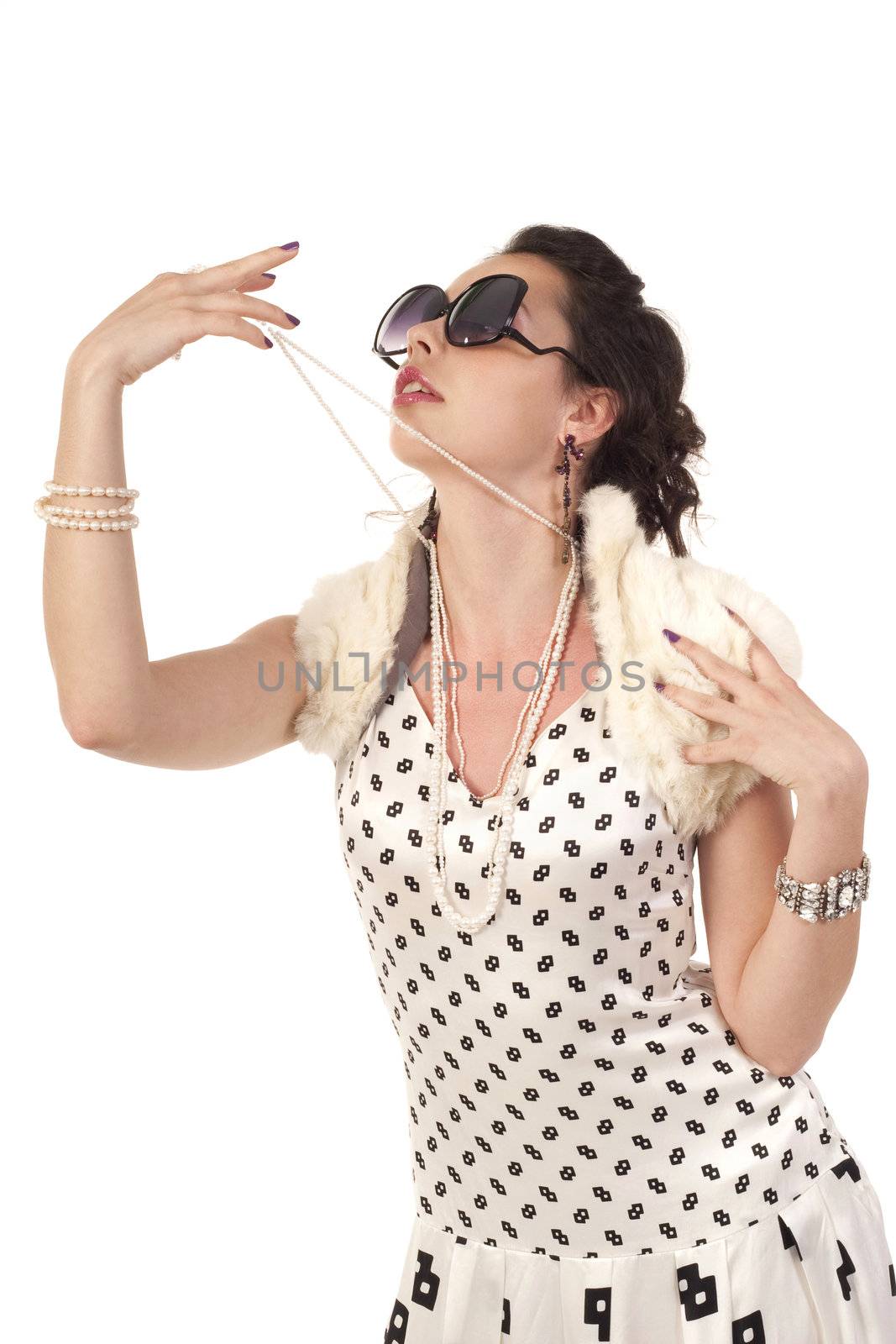 Girl in classic dress posing to the camera