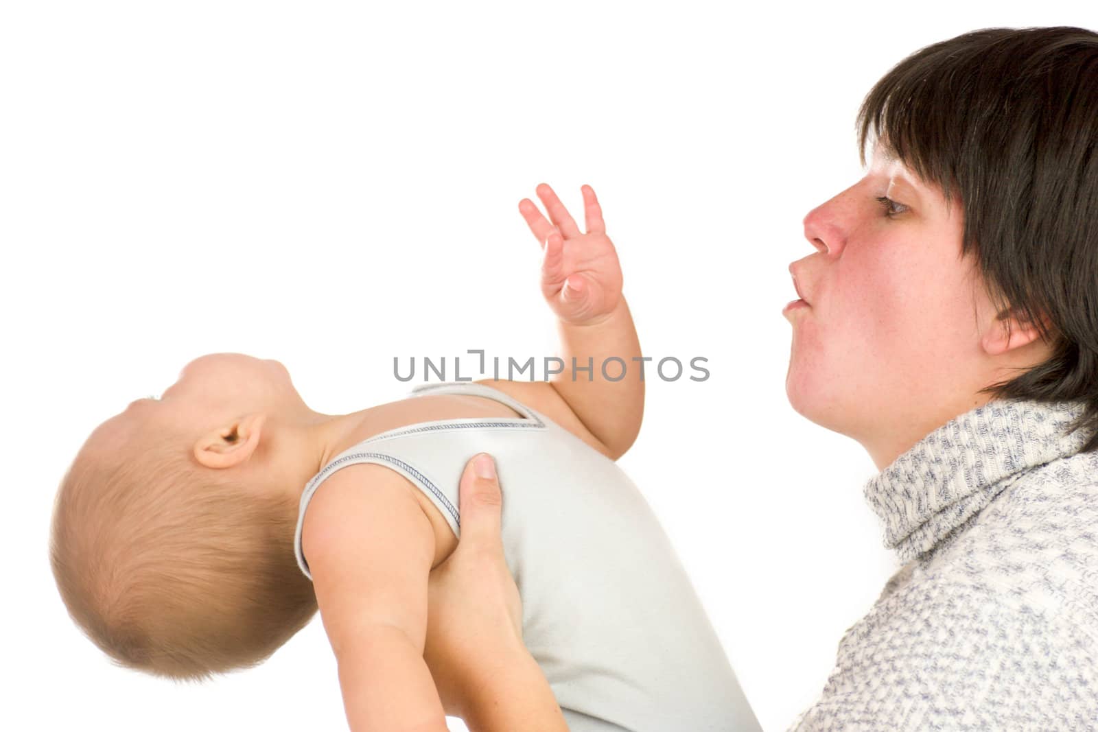 Mother with baby exercising isolated on white