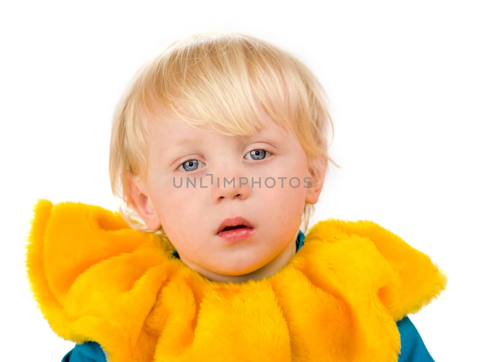 Portrait of Sad child wearing huge yellow clown collar isolated on white