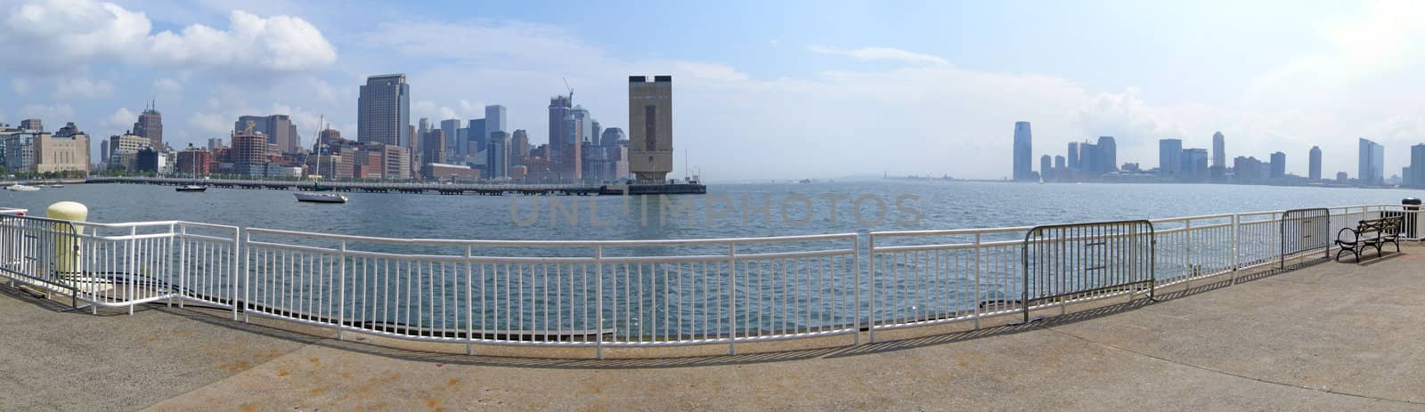 manhattan panorama, holland tunnel ventilation in the middle, jersey city in distance