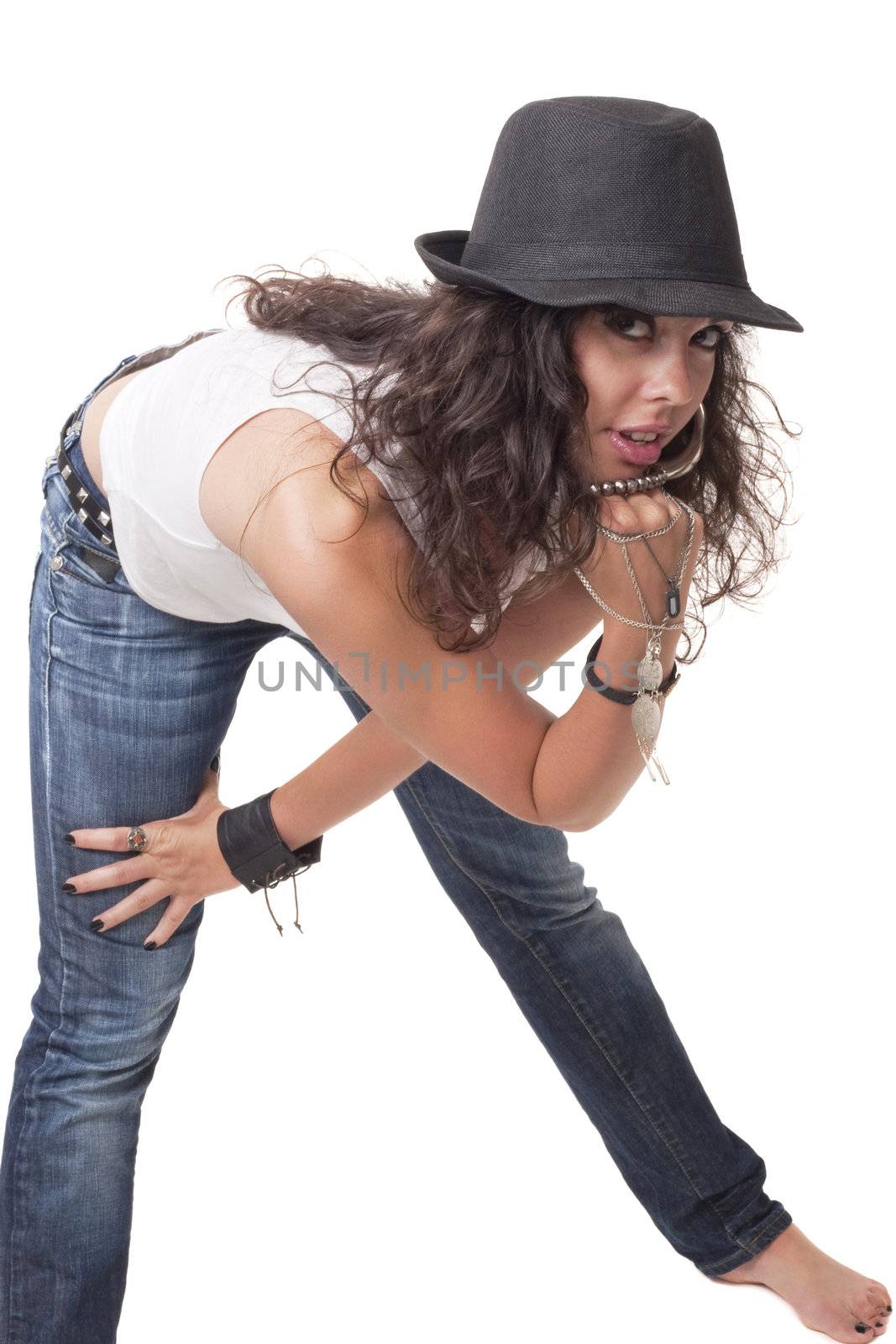 Young brunette girl posing for photo in funny position