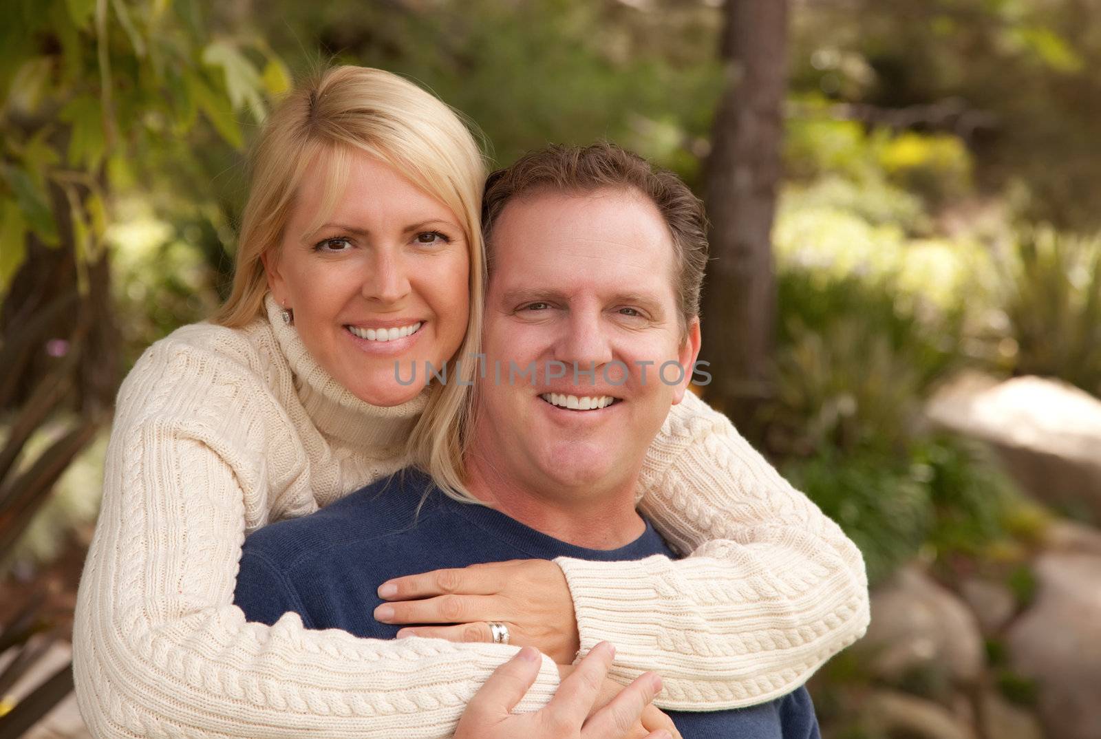 Happy Attractive Adult Couple Portrait in the Park.