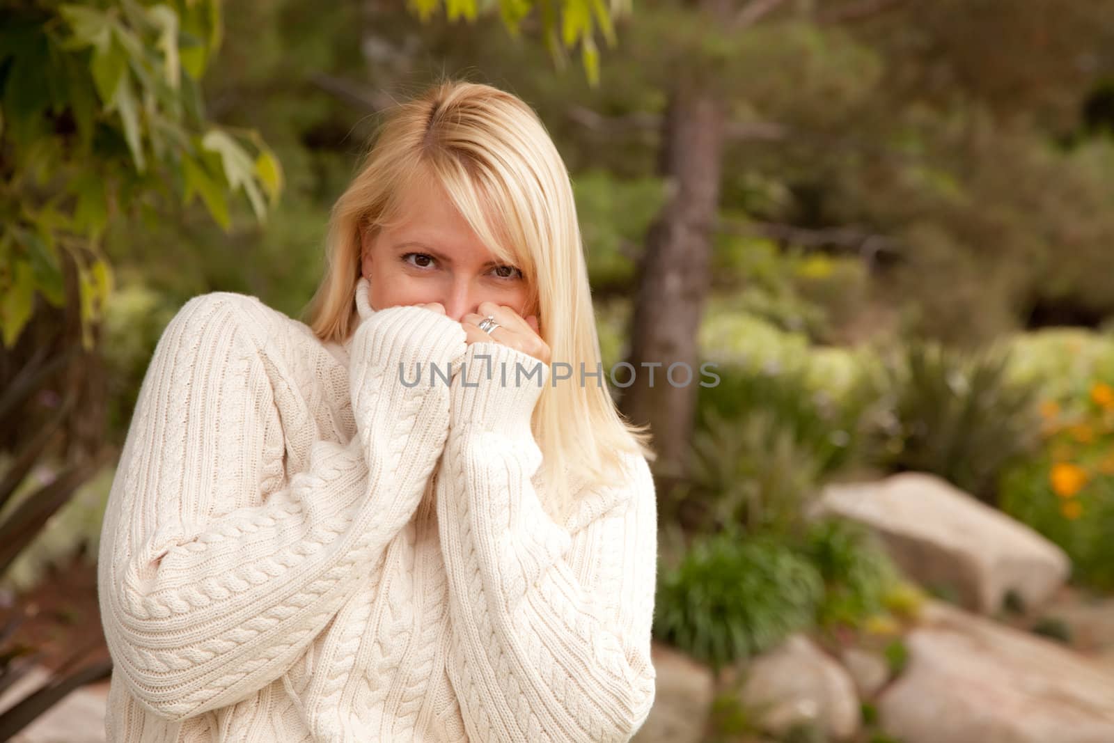 Attractive Blonde Woman in the Park by Feverpitched