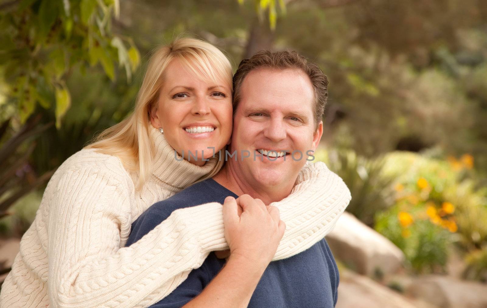 Happy Attractive Adult Couple Portrait in the Park.