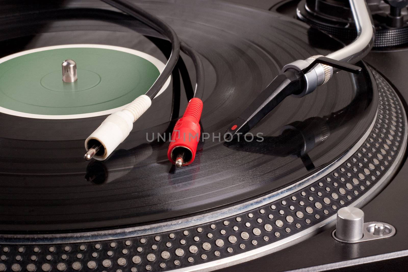 Vinyl player playing record closeup