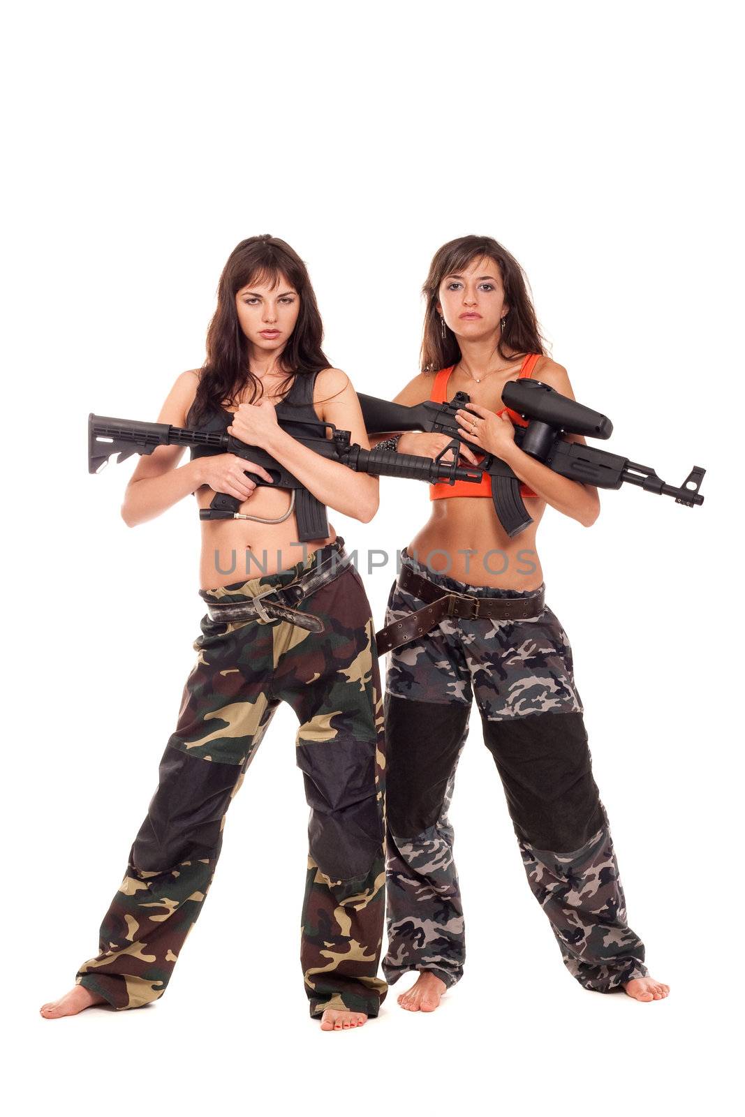 Image of a two armed paintball players posing to the camera