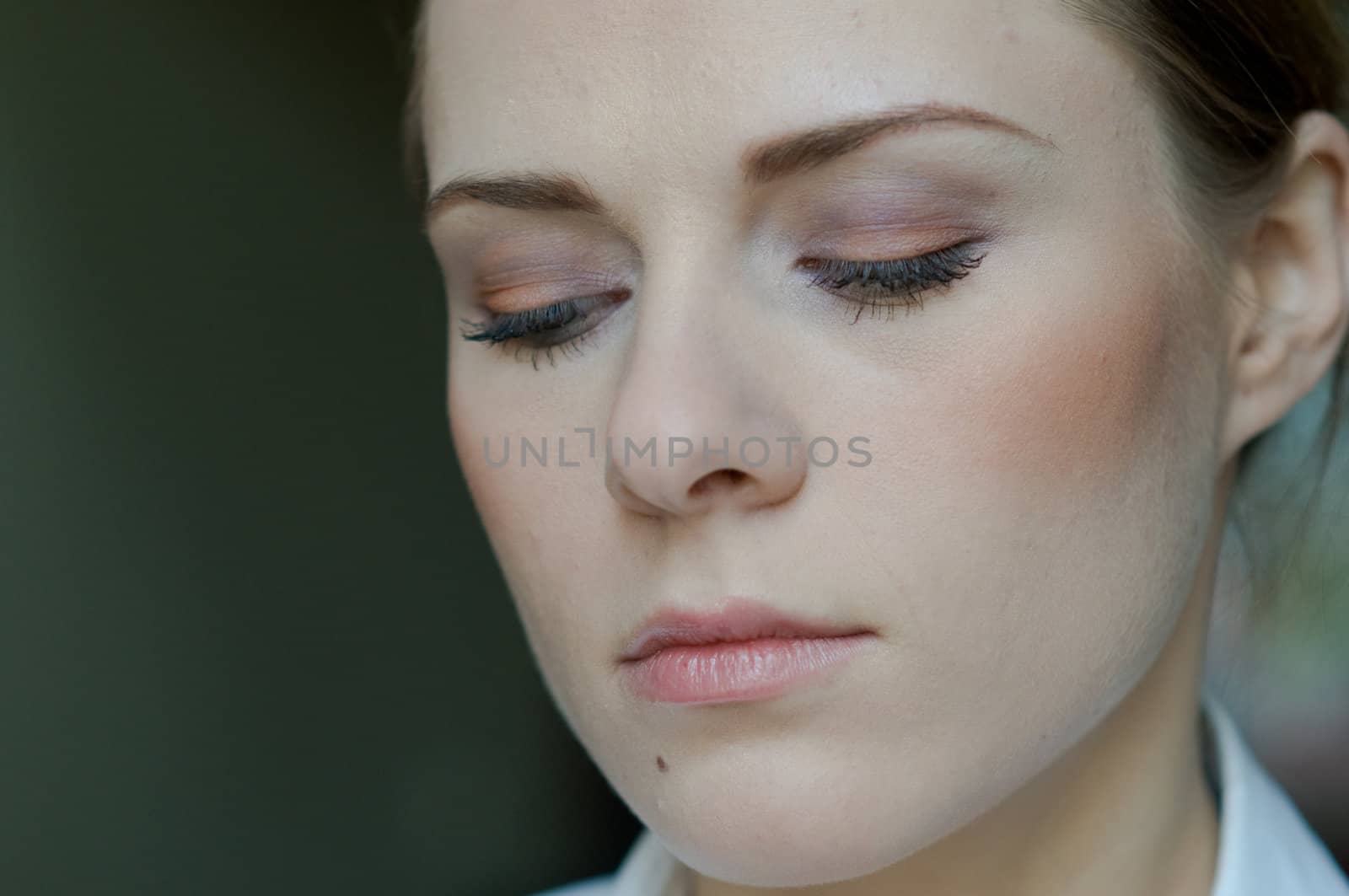 Pretty woman makeup series. Closeup on face.