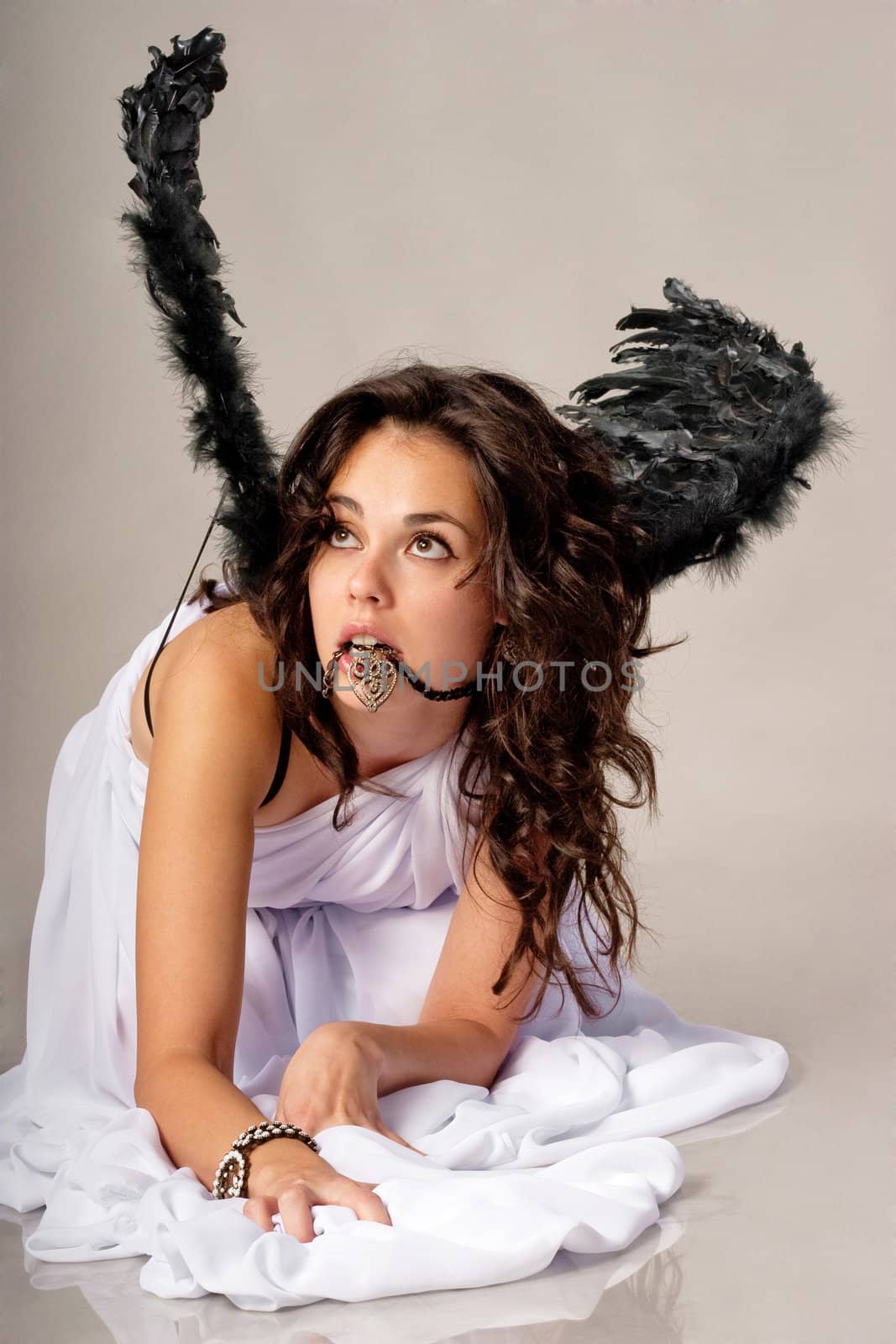 Cute girl playing an angel by igor_stramyk