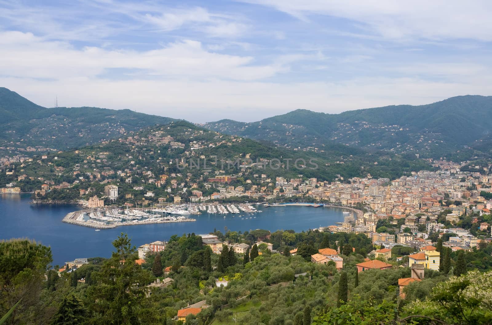 panorama of Rapallo and the Tigullio gulf in Liguria, mediterranean sea. Photo taken with polarizer filter