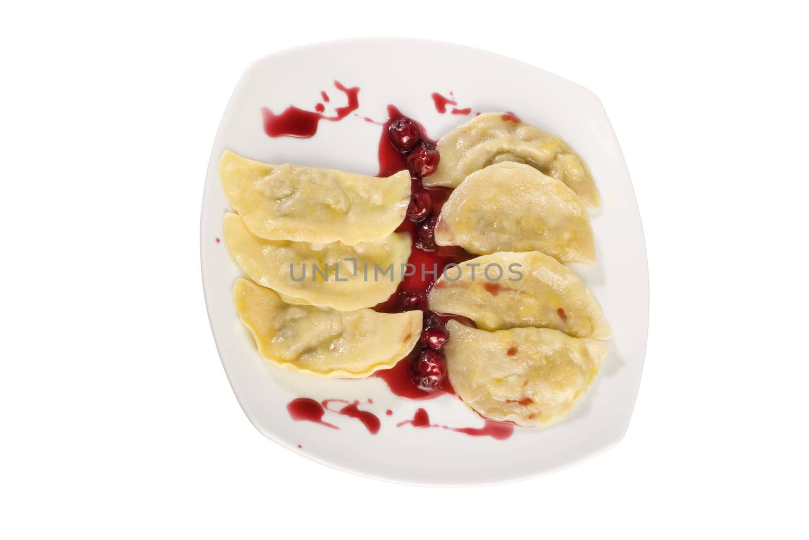 Ukrainian national dish varenyky (ravioli) with cherry closeup. File includes clipping path.
