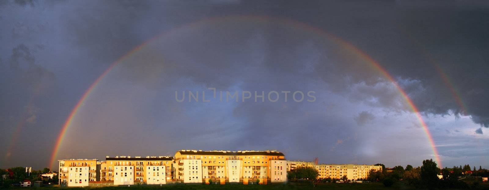 Rainbow over the city by remik44992