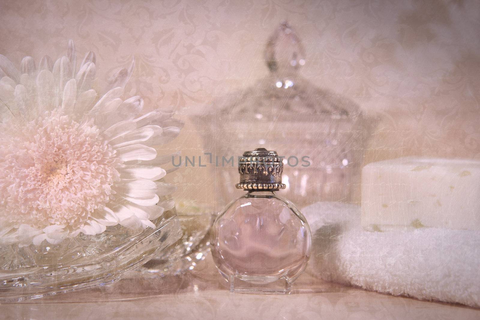 Vintage perfume bottle with flower and soap