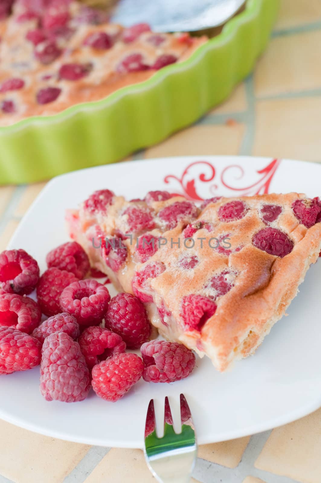 Shot of raspberry pie on the table