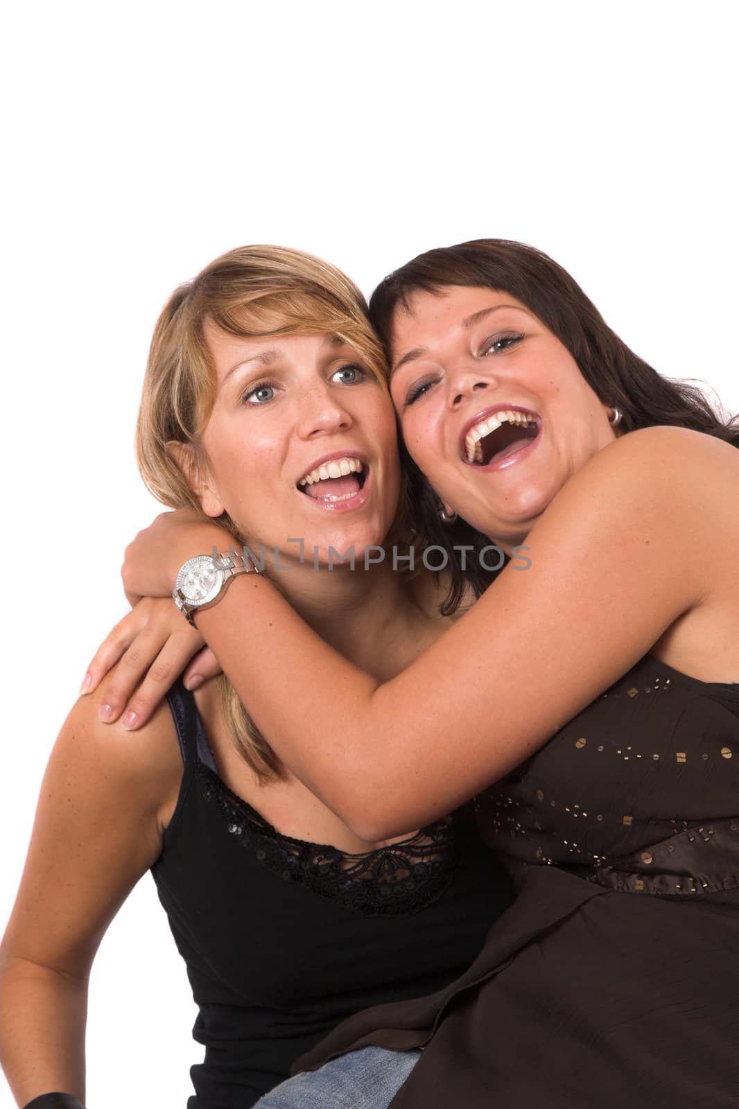 Two sisters having fun together, laughing out loud