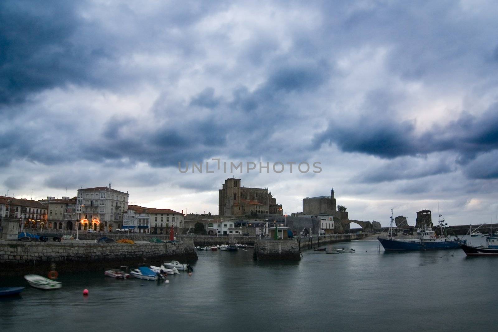 Boats in the harbour near the city