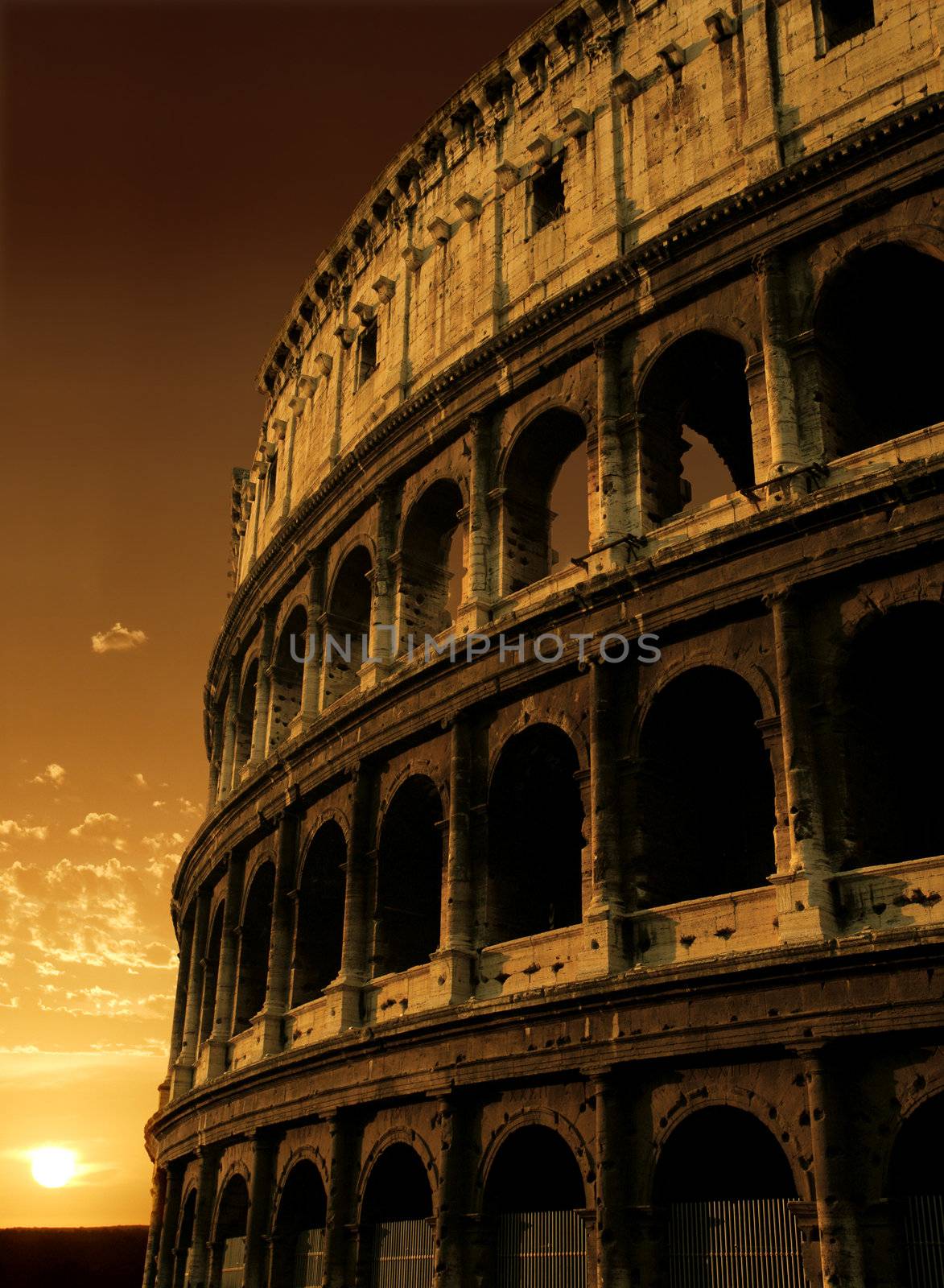The Colosseum in Rome, Italy during a sunrise.
