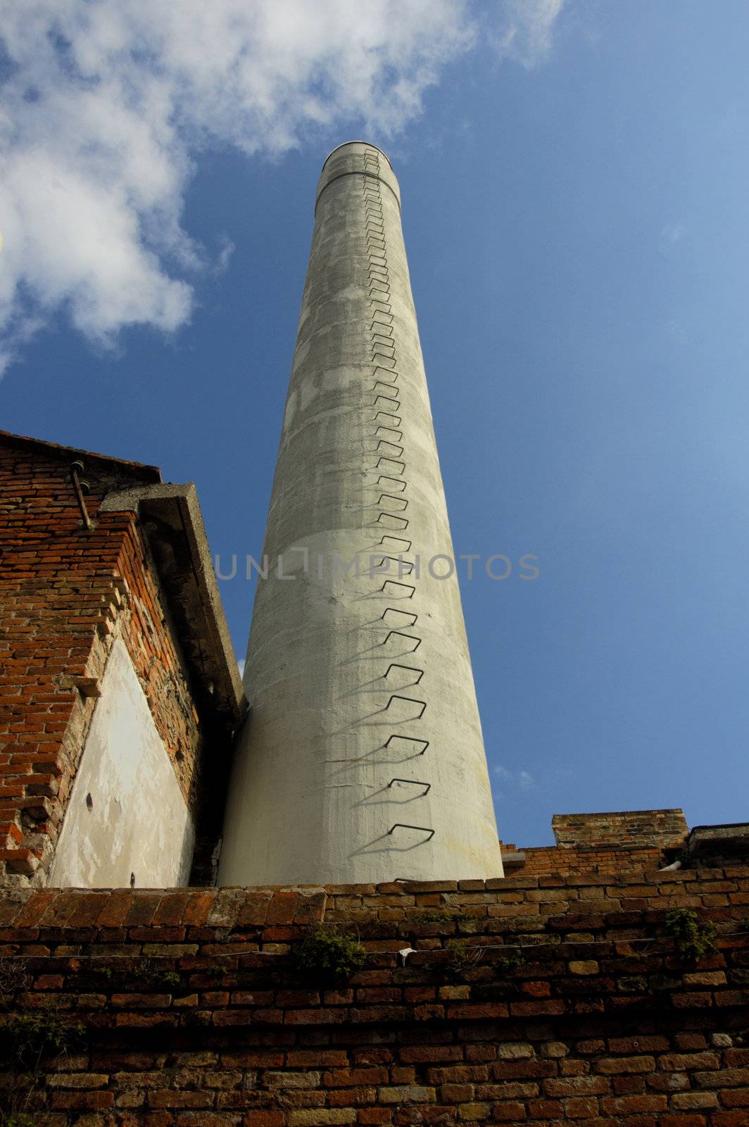 A factory chimney on the Venetian island of Murano, where glass is made.