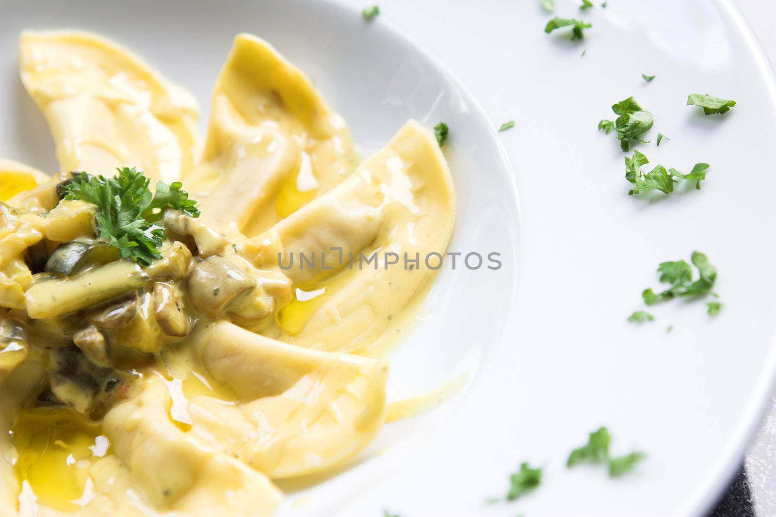 Fresh pasta with a sauce made of mushrooms, chopped into tiiny pieces, cream and wine