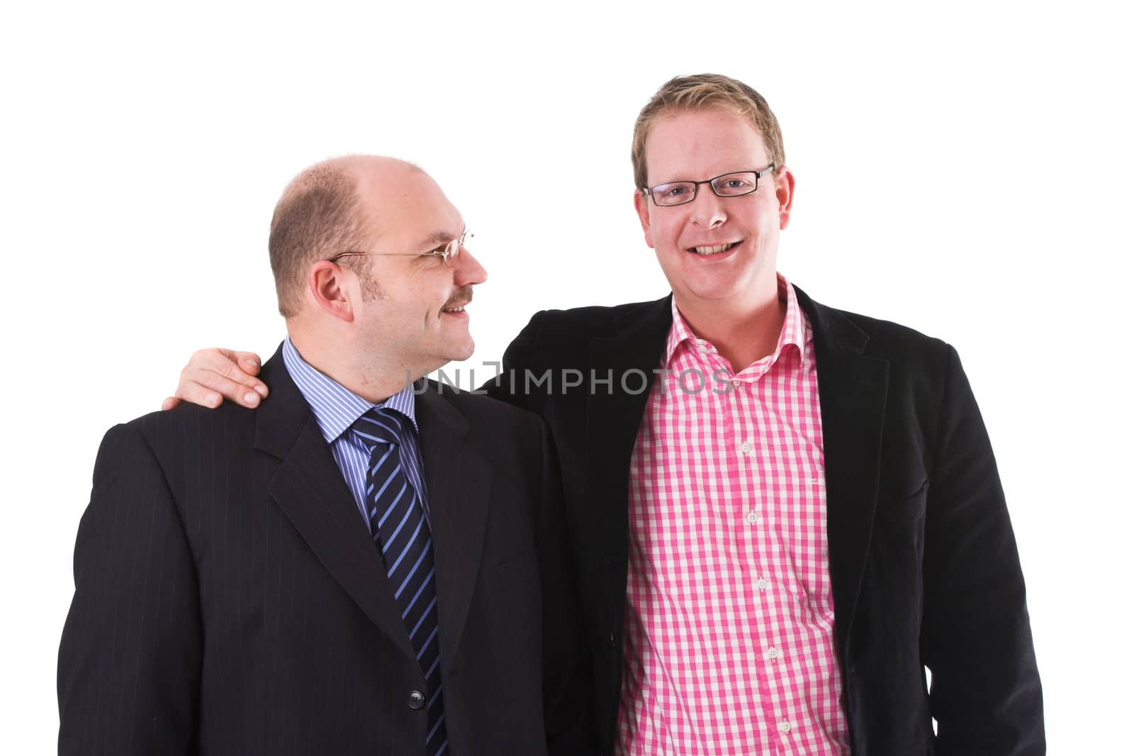 Two mature businessman standing next to each other