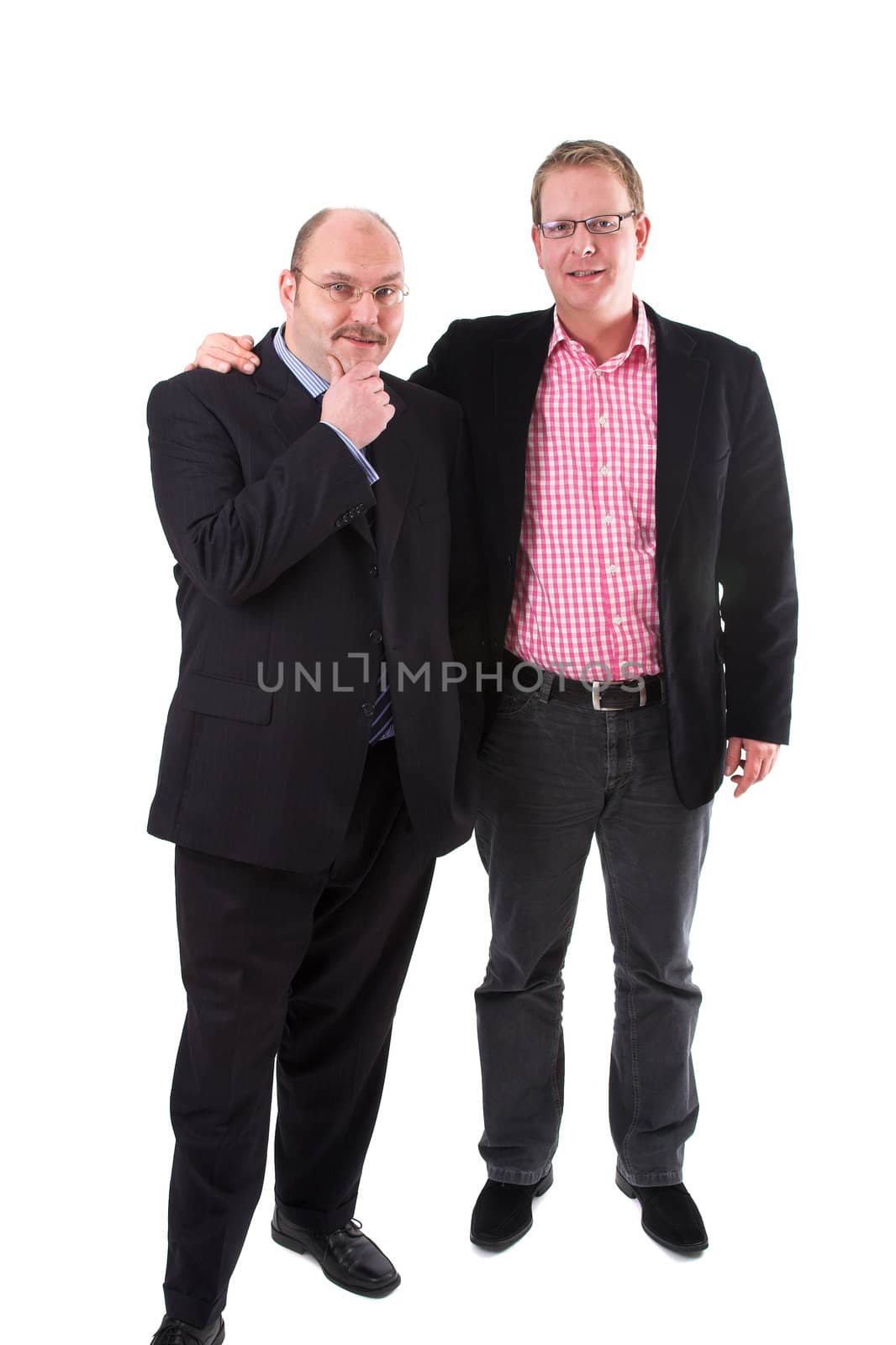 Two businessman standing on white background dressed in suits