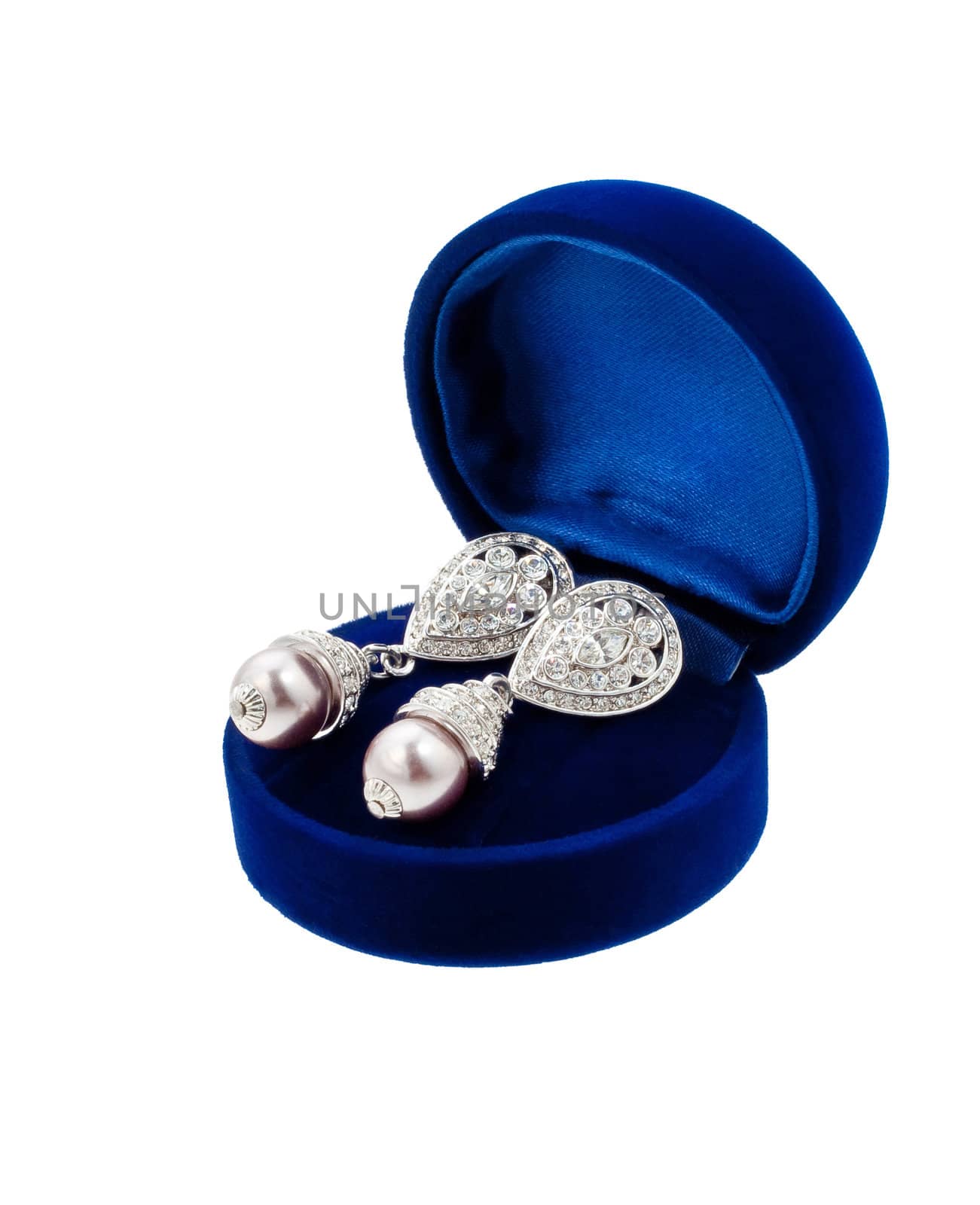 Pearl earring with diamonds in blue present box isolated