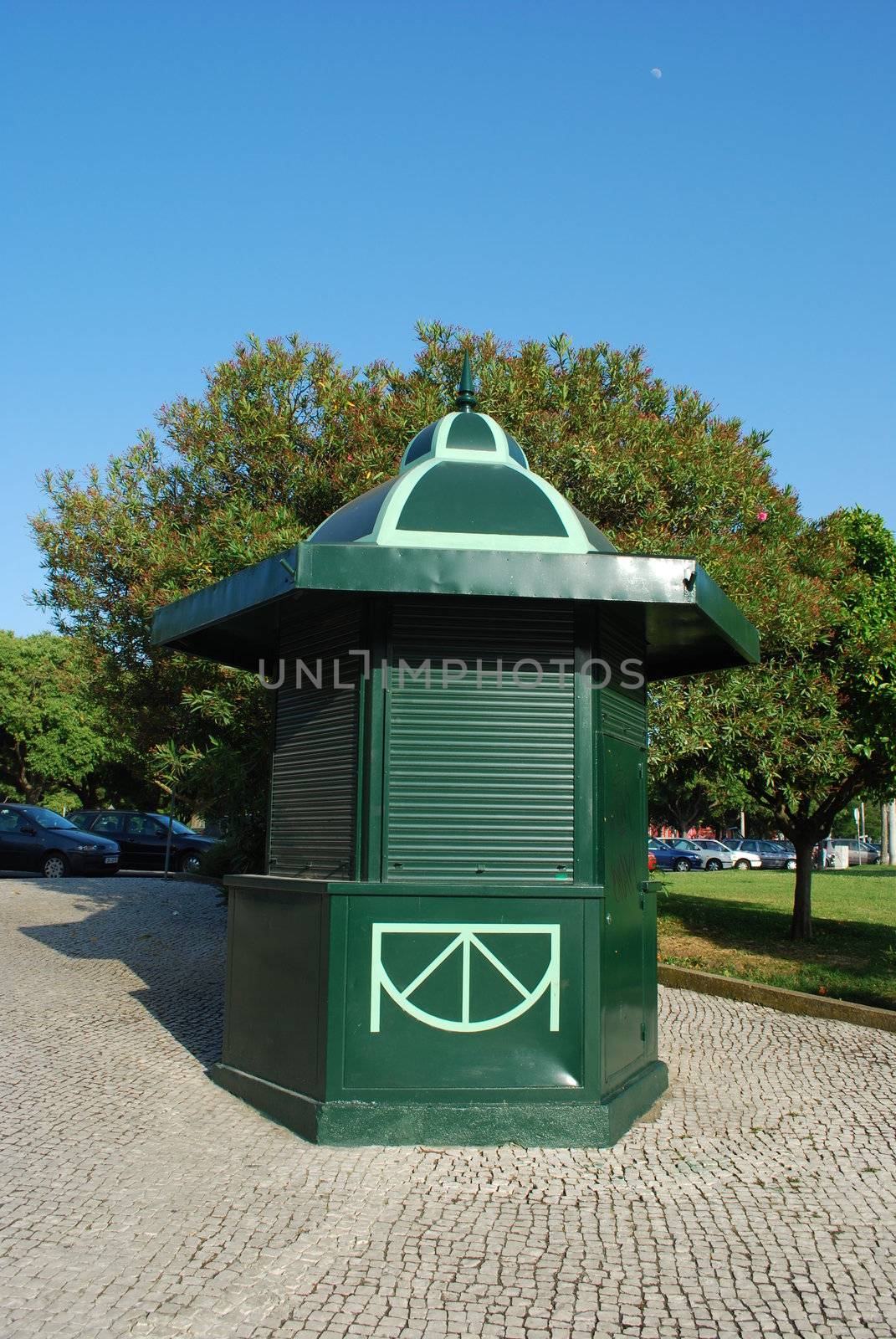 Green kiosk in a local park by luissantos84