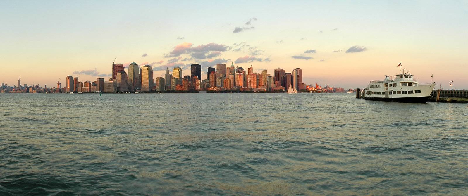 Manhattan panorama photo viewed from jersey city, white passenger boat anchoring, New York, USA