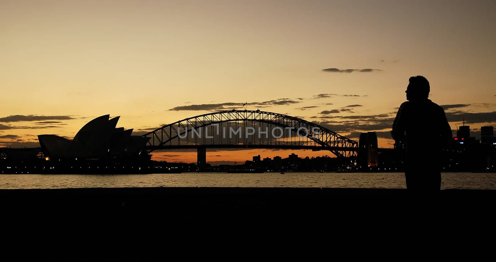 opera house, harbor bridge and a man silhouettes, dusk photo, Sydney, Australia