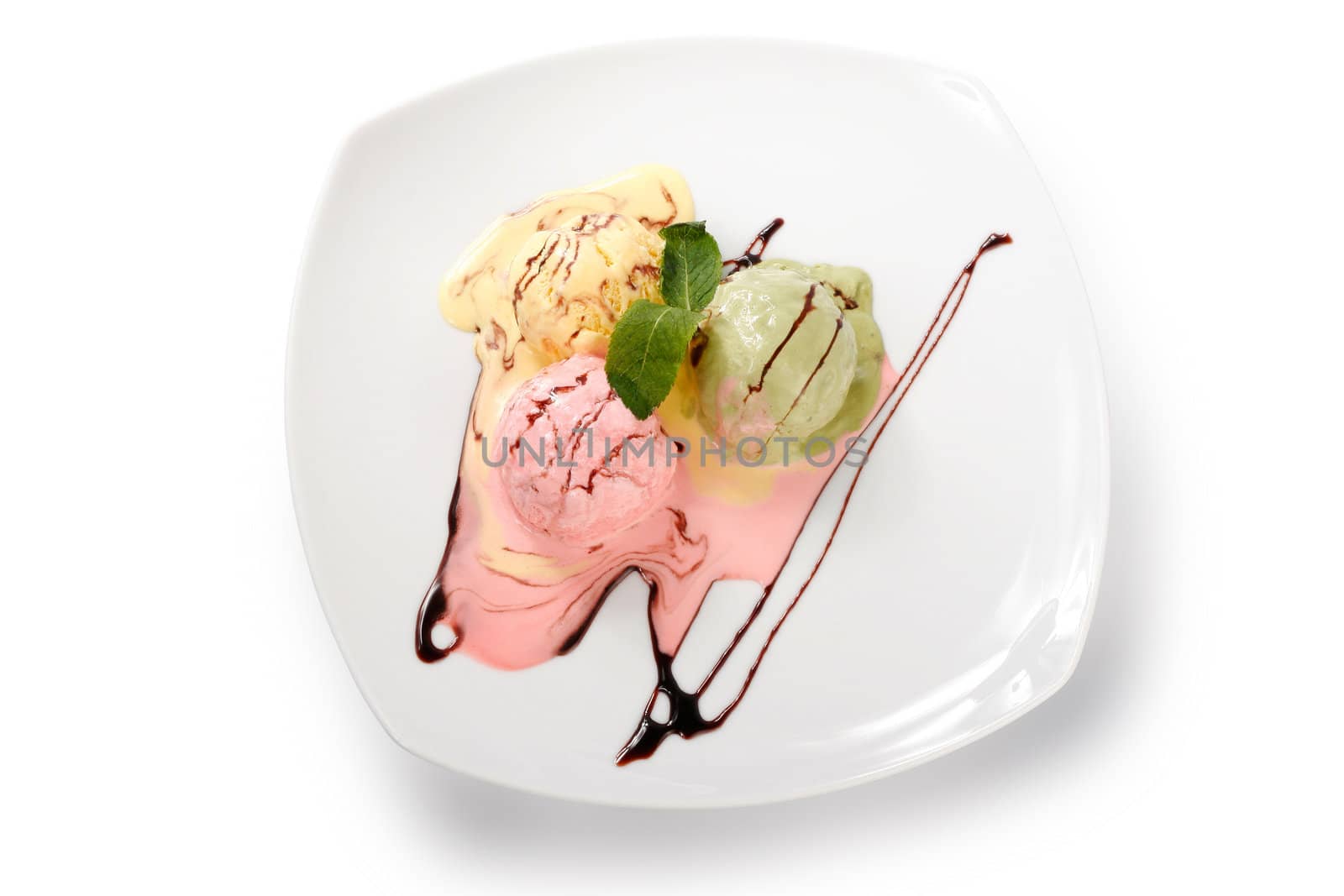 Colored ice cream on a plate by igor_stramyk