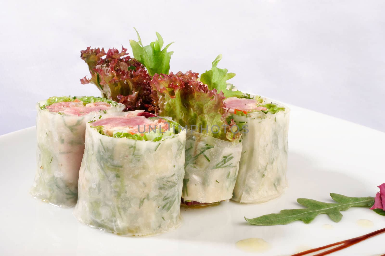 Image of sushi decorated with lettuce by igor_stramyk