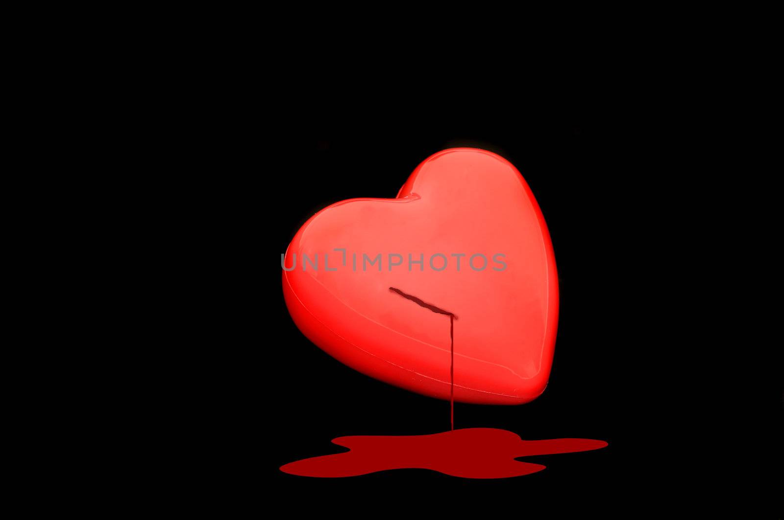 Red heart isolated on a dark back ground