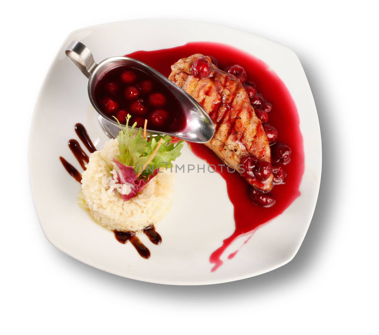 Delicious beef with cherry sauce. File includes clipping path for easy background removing