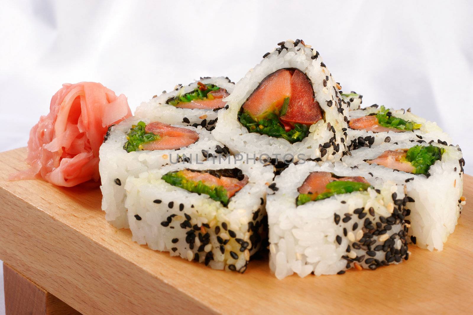 Sushi rolls with tuna and green onion