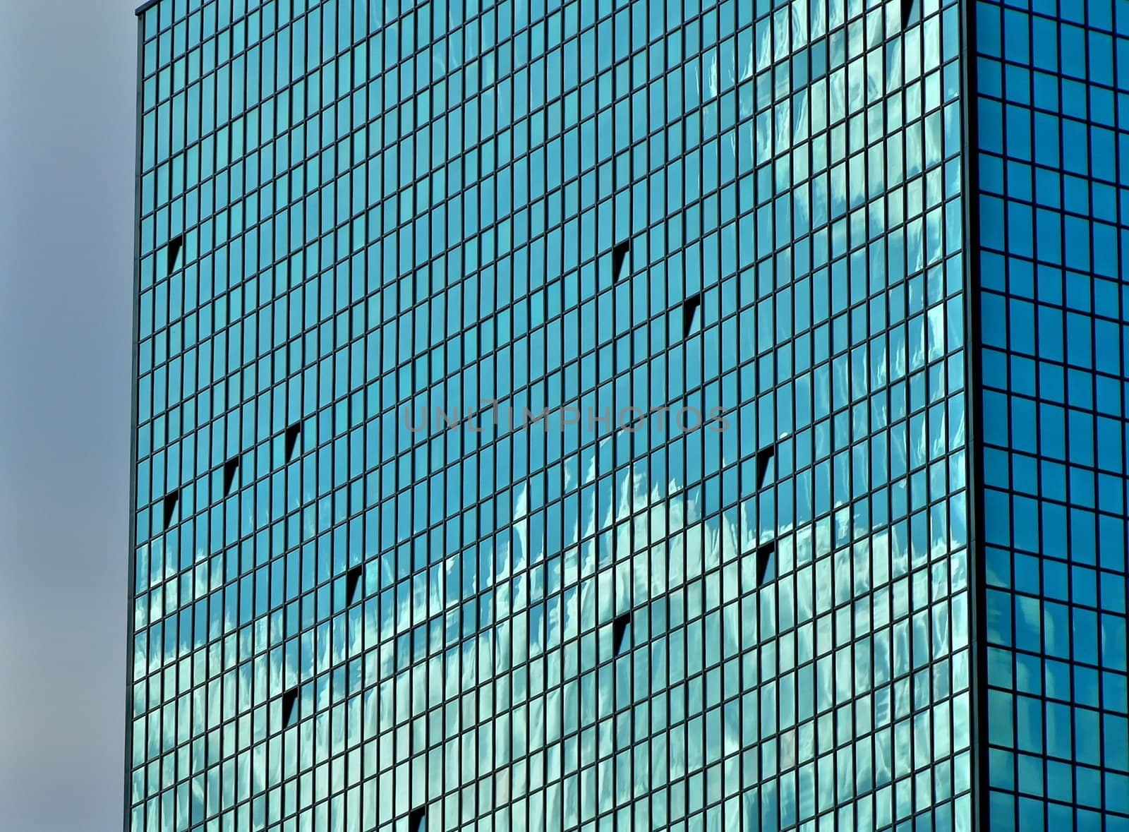 Glass building closeup in Warsaw city center