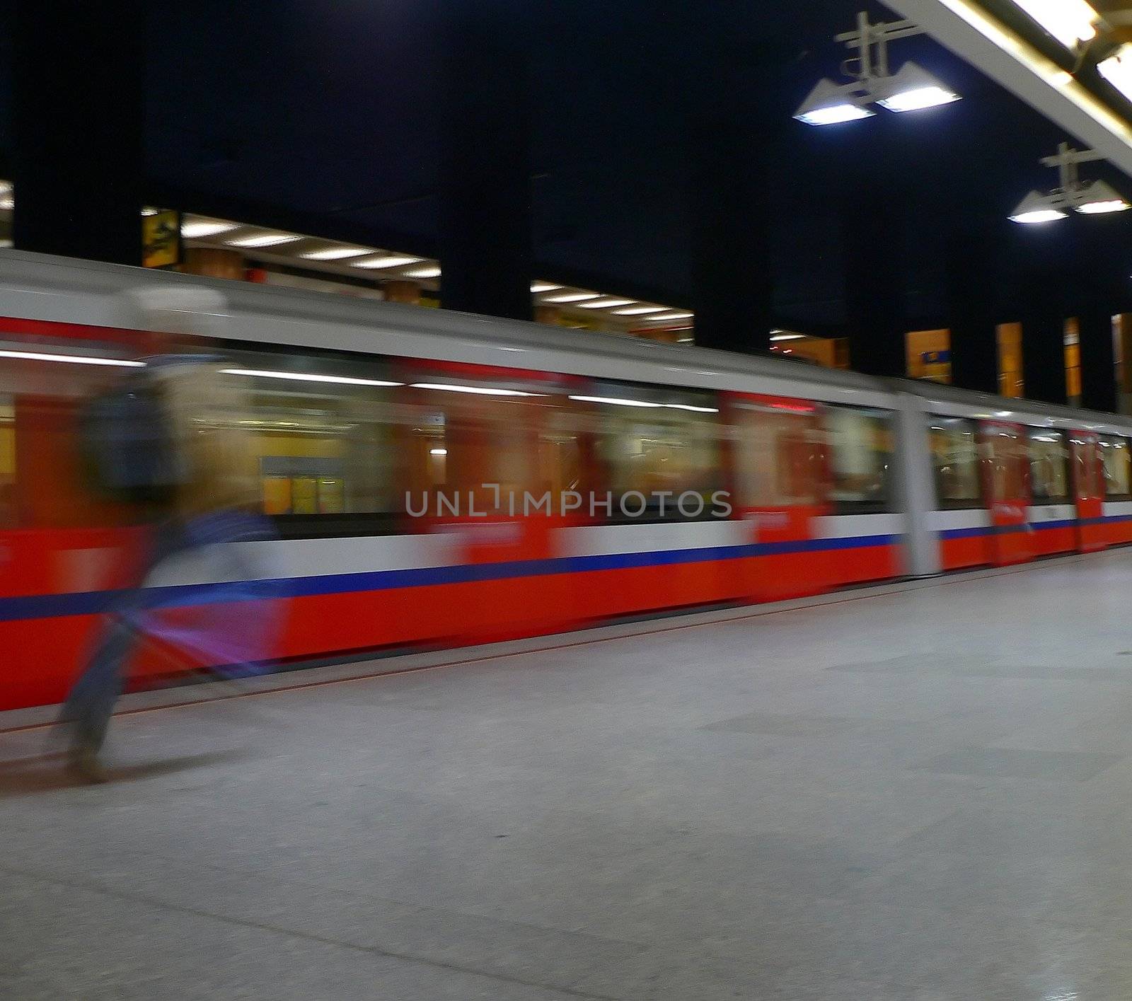 man running to catch the metro in Warsaw 
