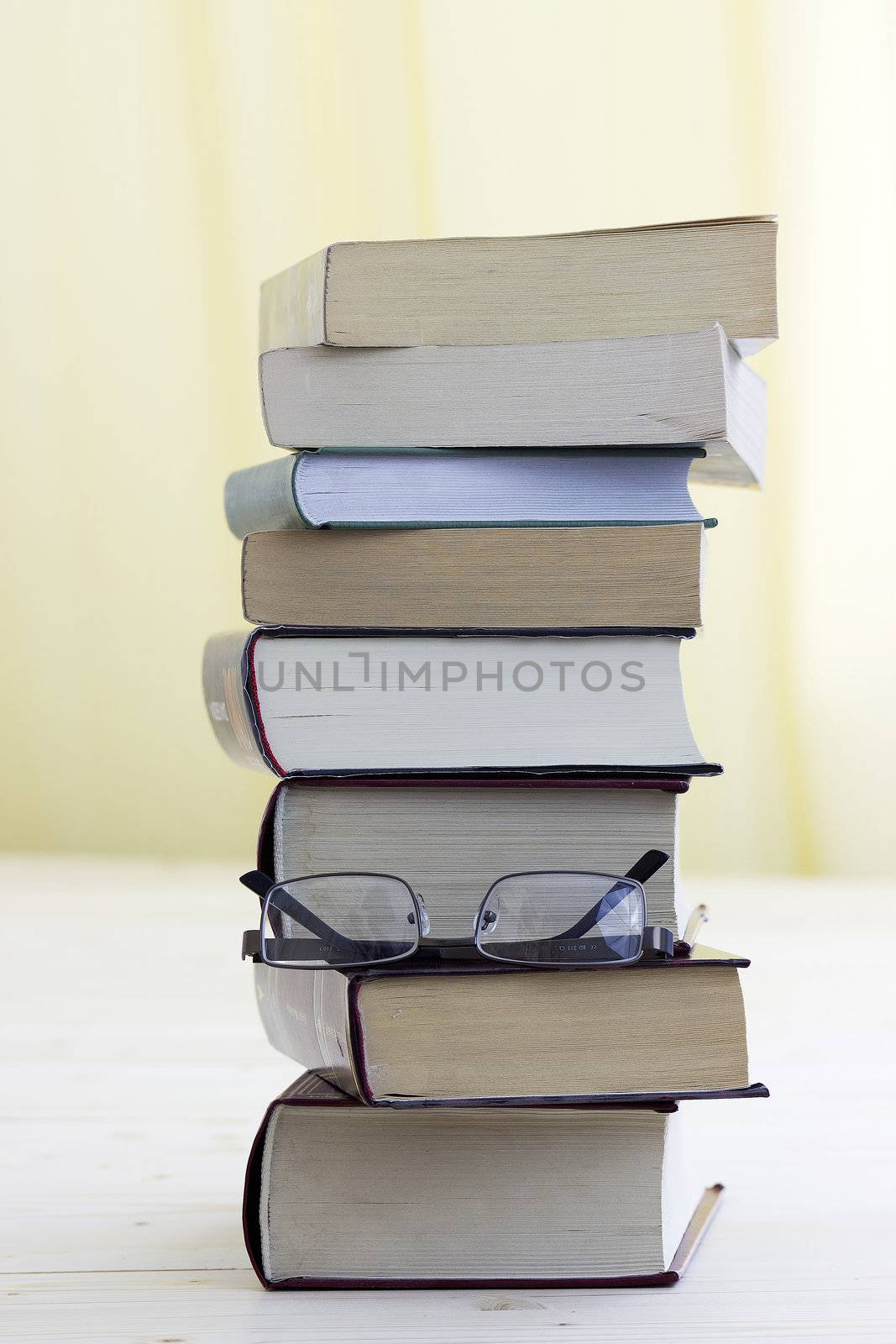books stack and glasses