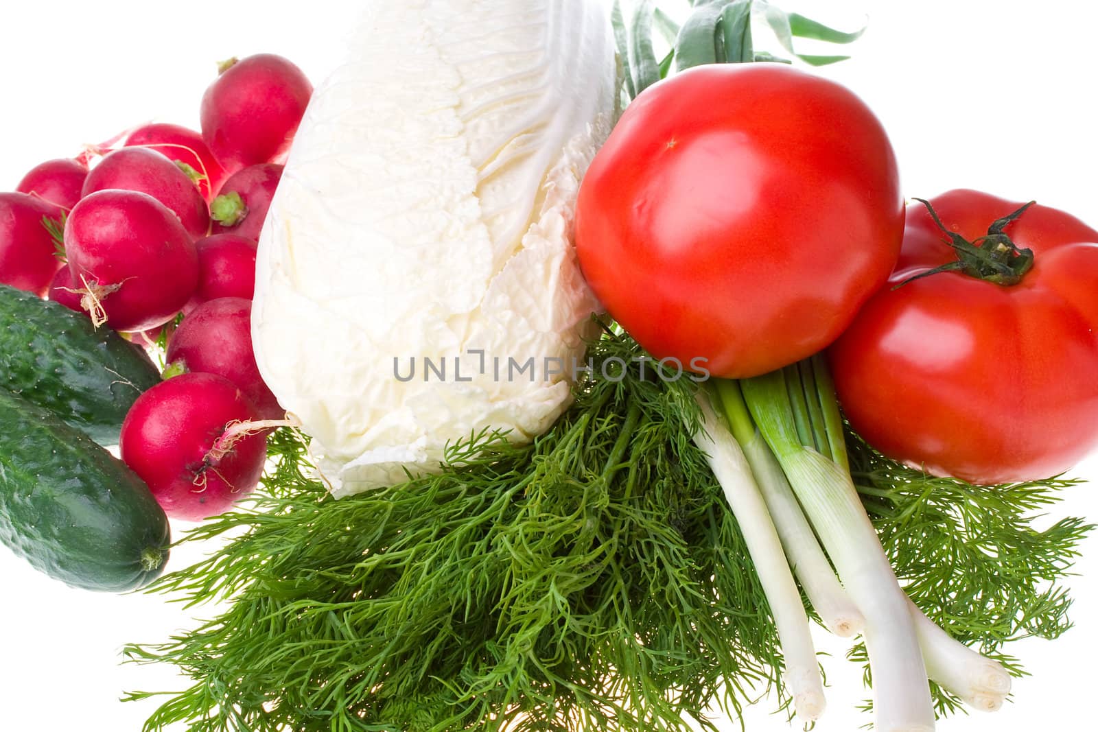 close-up heap of fresh various vegetables, isolated on white