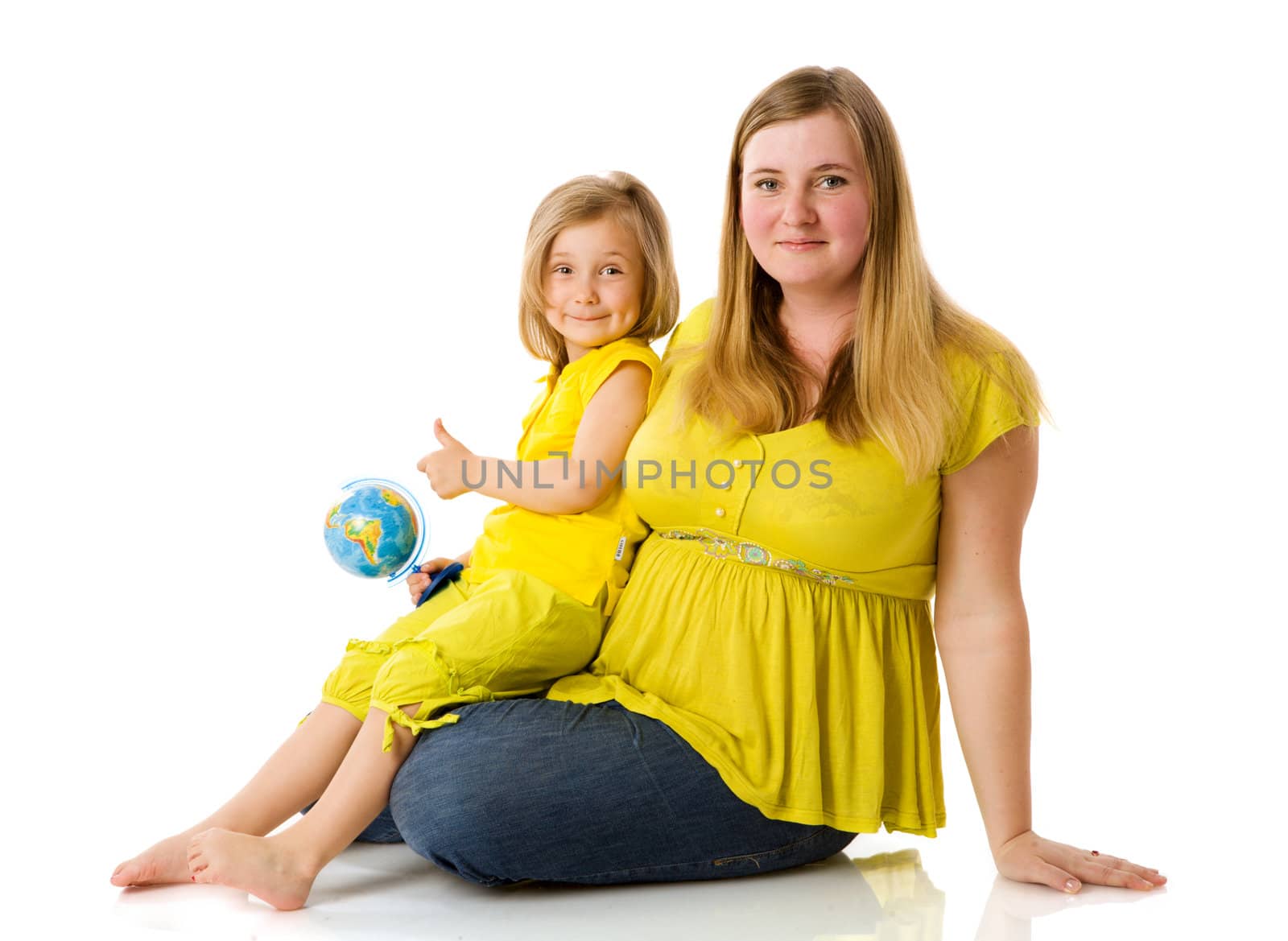 mother and daughter holding globe isolated on white