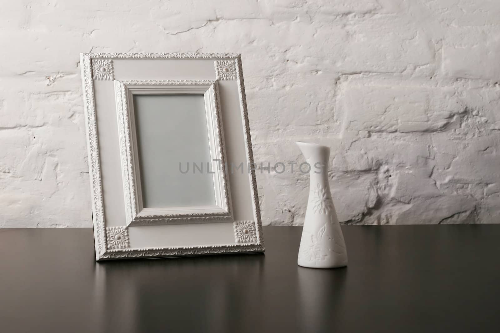 composition with vintage fotoframe and vase by igor_stramyk