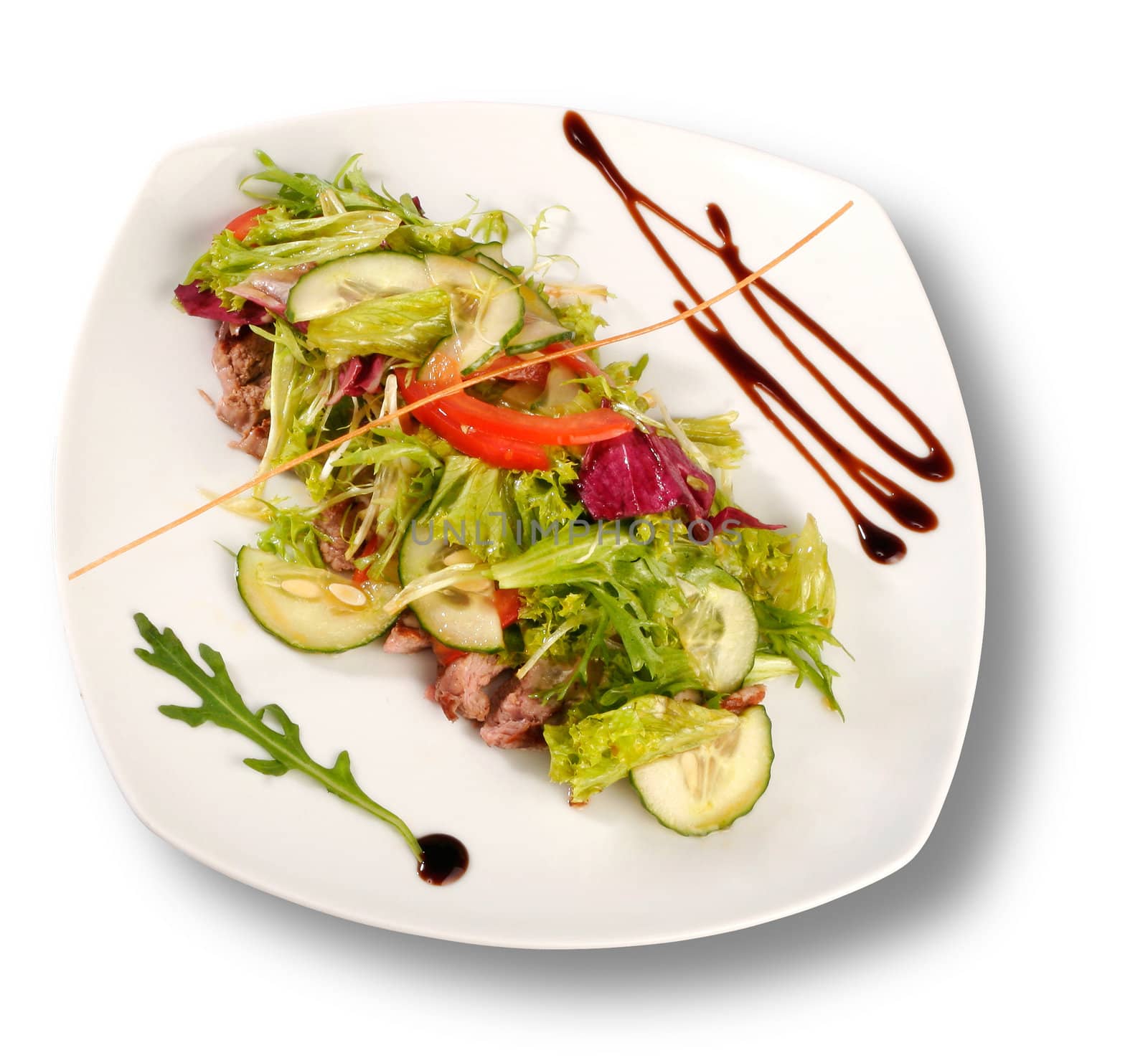 A plate of pork with vegetables. File includes clipping path for by igor_stramyk