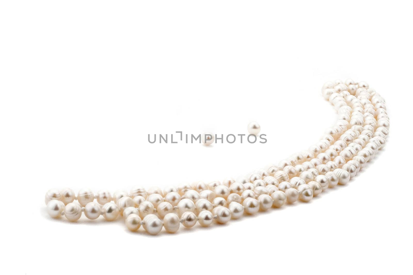 Pearl necklace on white background by igor_stramyk