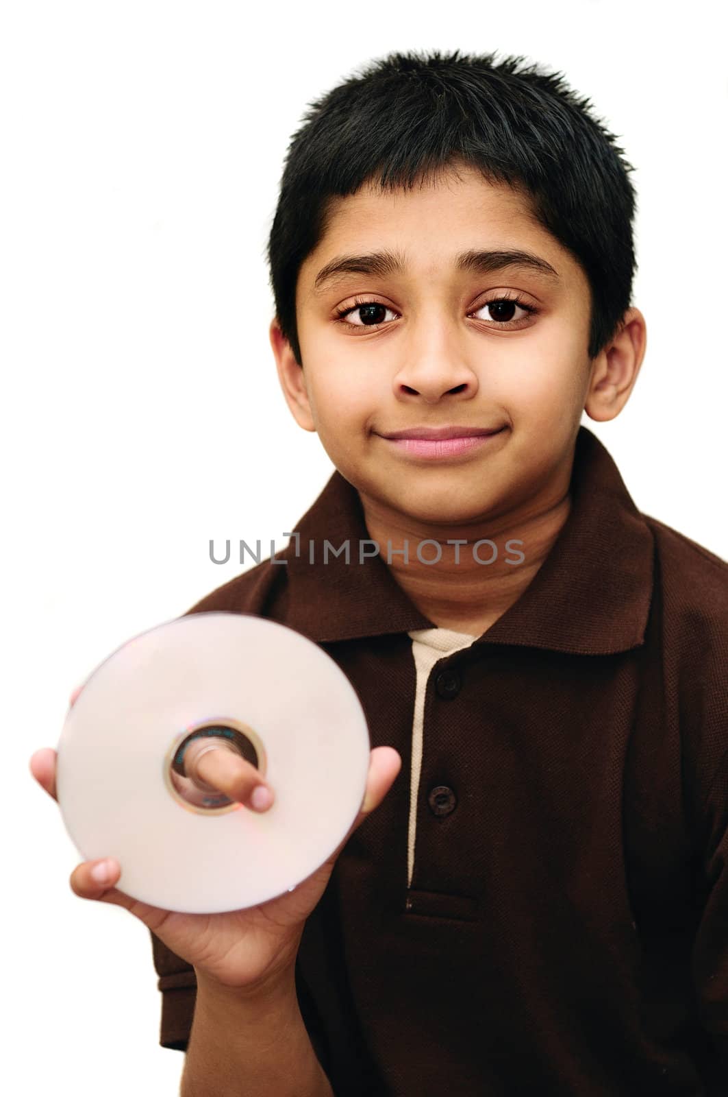 An hndsome Indian kid holding a disk representing data