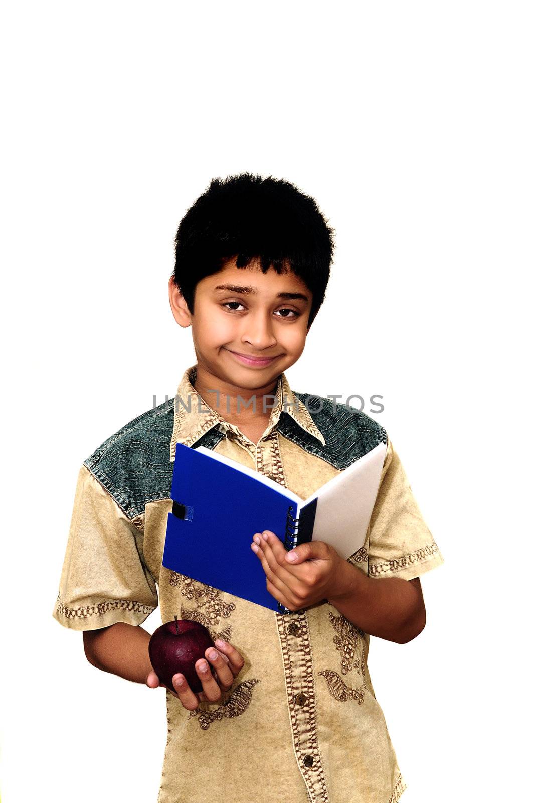 An handsome Indian kid holding apples with a smile