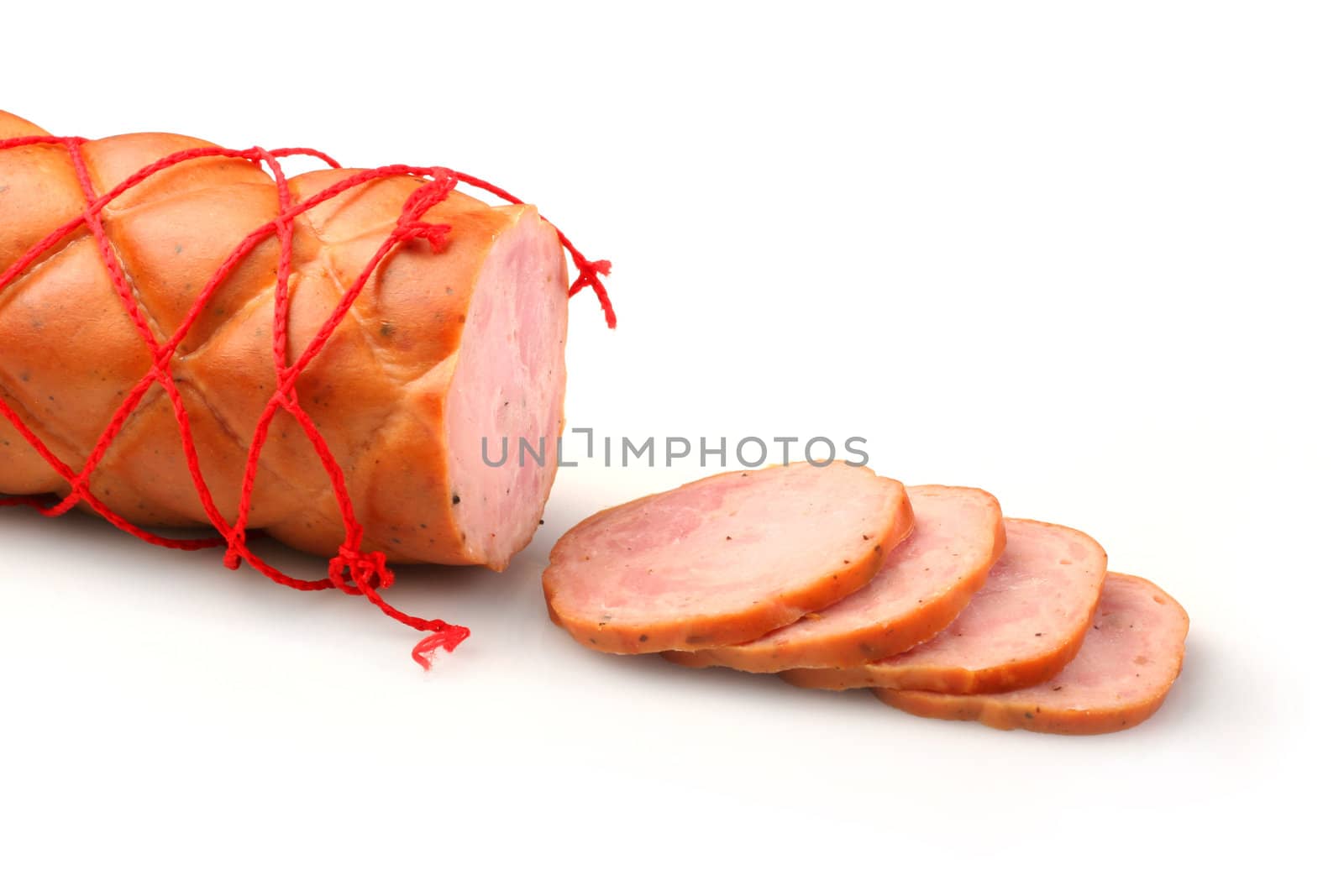 Sliced sausage on white background