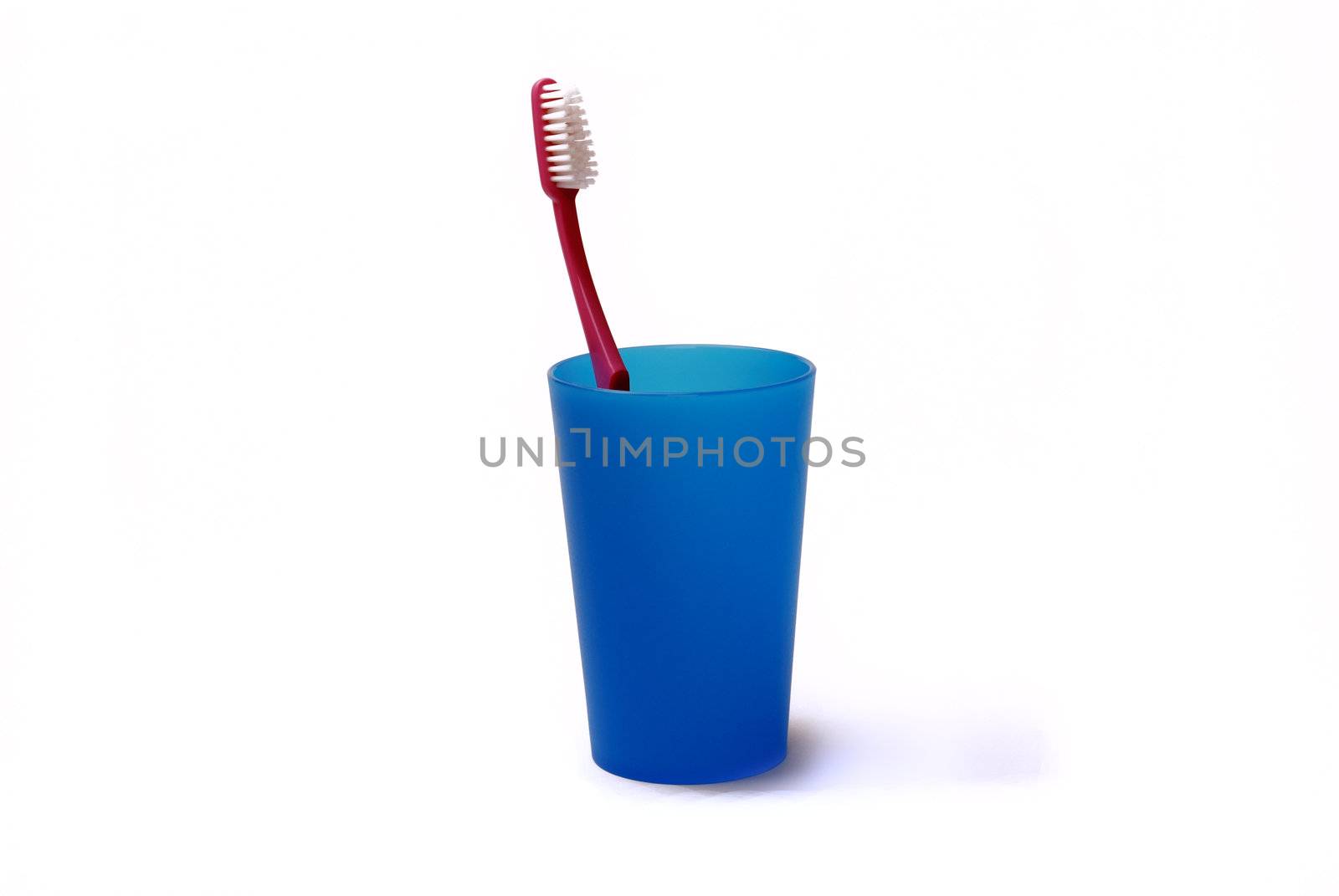Toothbrush in a color holder